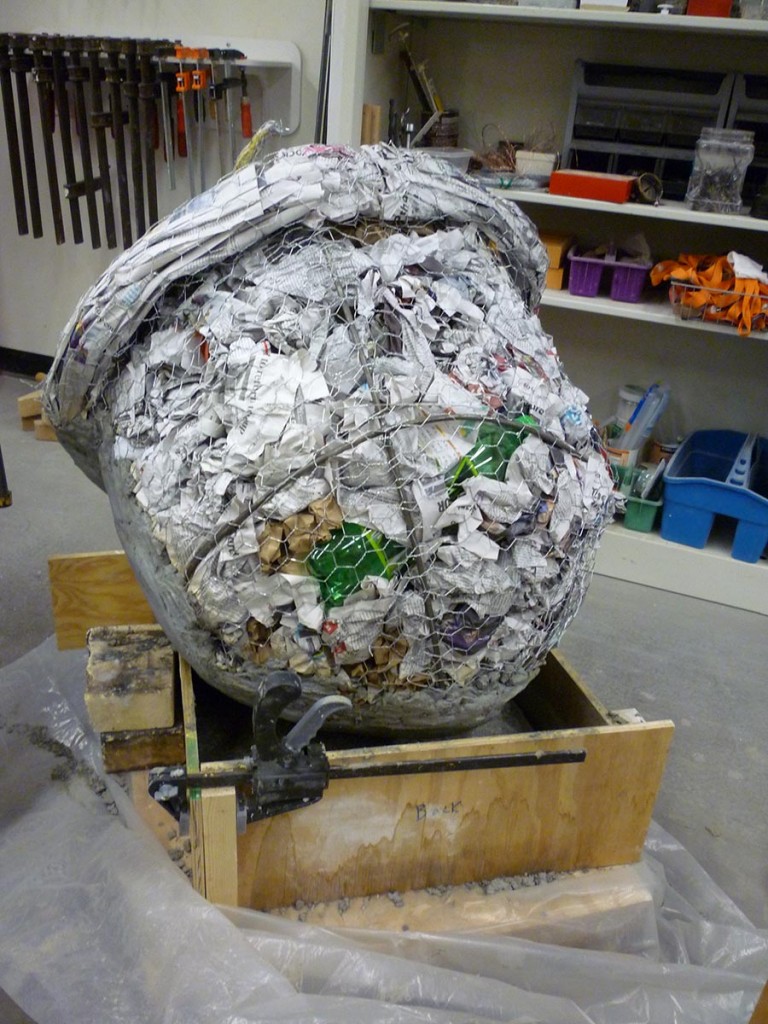 An acorn sculpture in progress, showing the armature and fill before the concrete was added. Even with the lightweight center the sculptures required several people to move each of them.