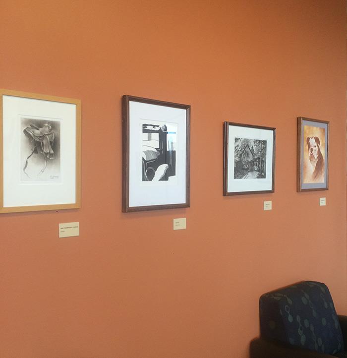 Jim Jereb's prints on display at the coffee shop in Pickler Memorial Library.